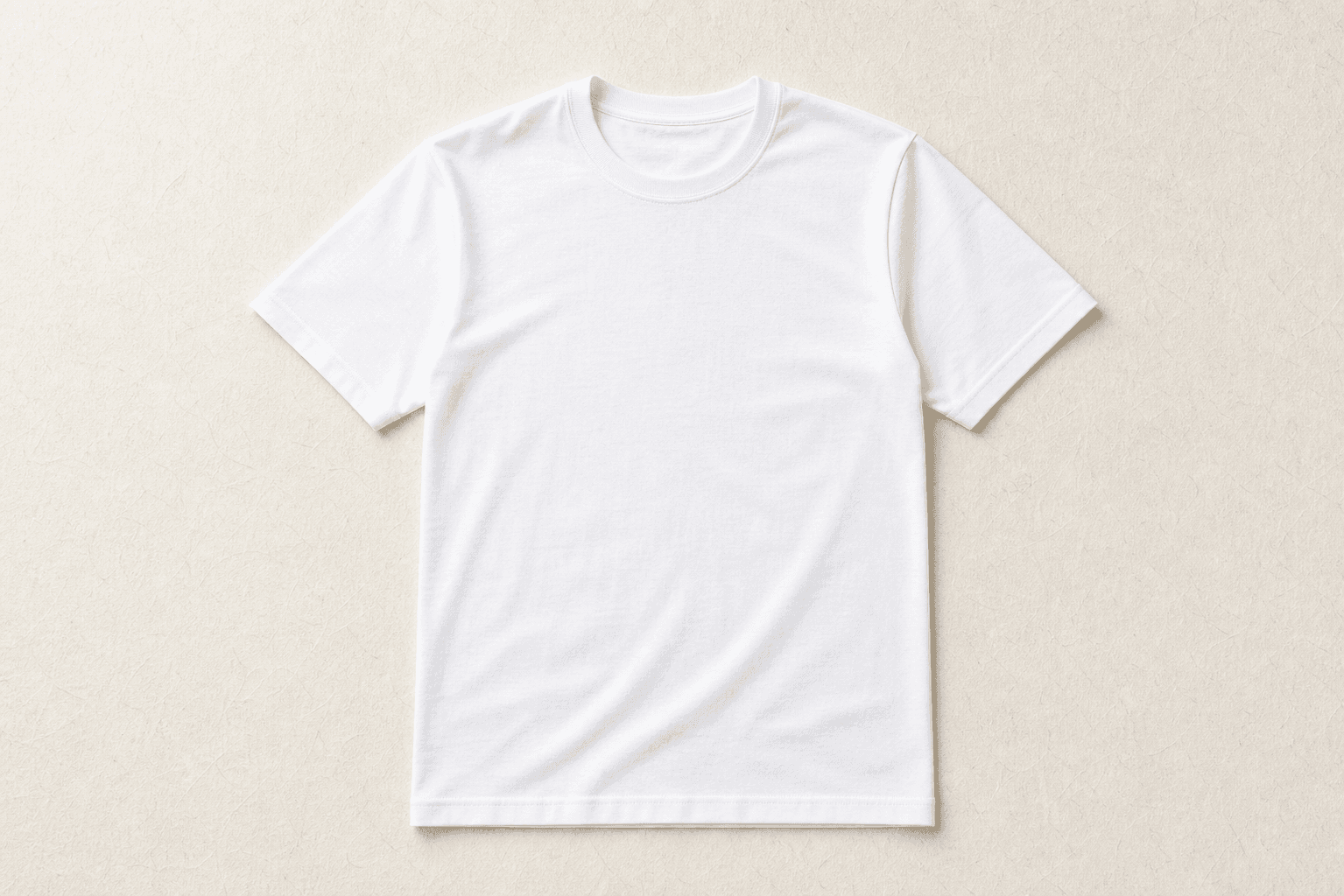 The First Tee white crewneck T-shirt laid flat
